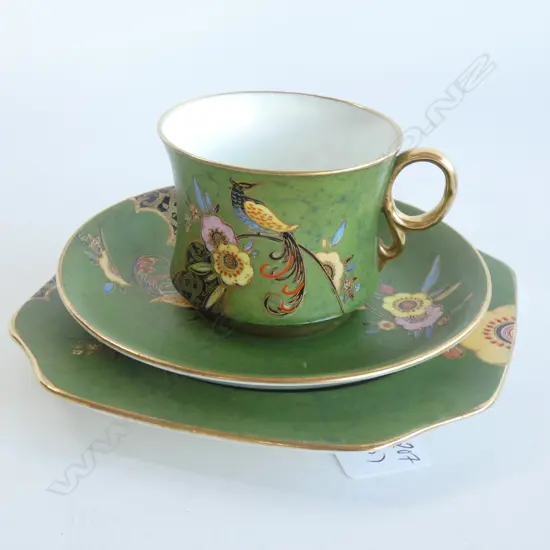 A Carlton ware "Long Tailed Bird" pattern trio